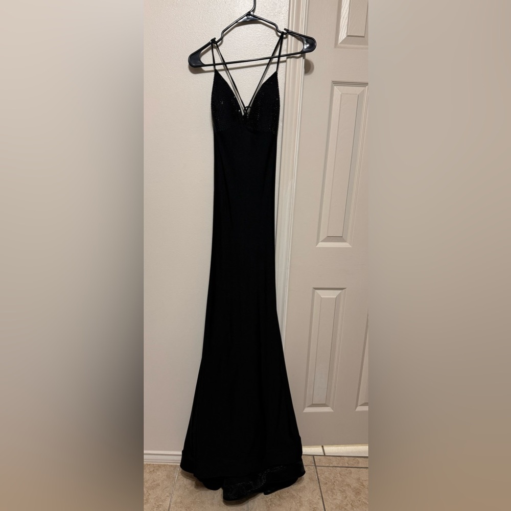 All black night gown with rhinestones on breast area. Size M, no alterations.